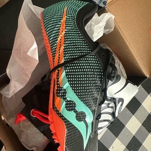 Womens saucony track spikes size 10. Never worn.